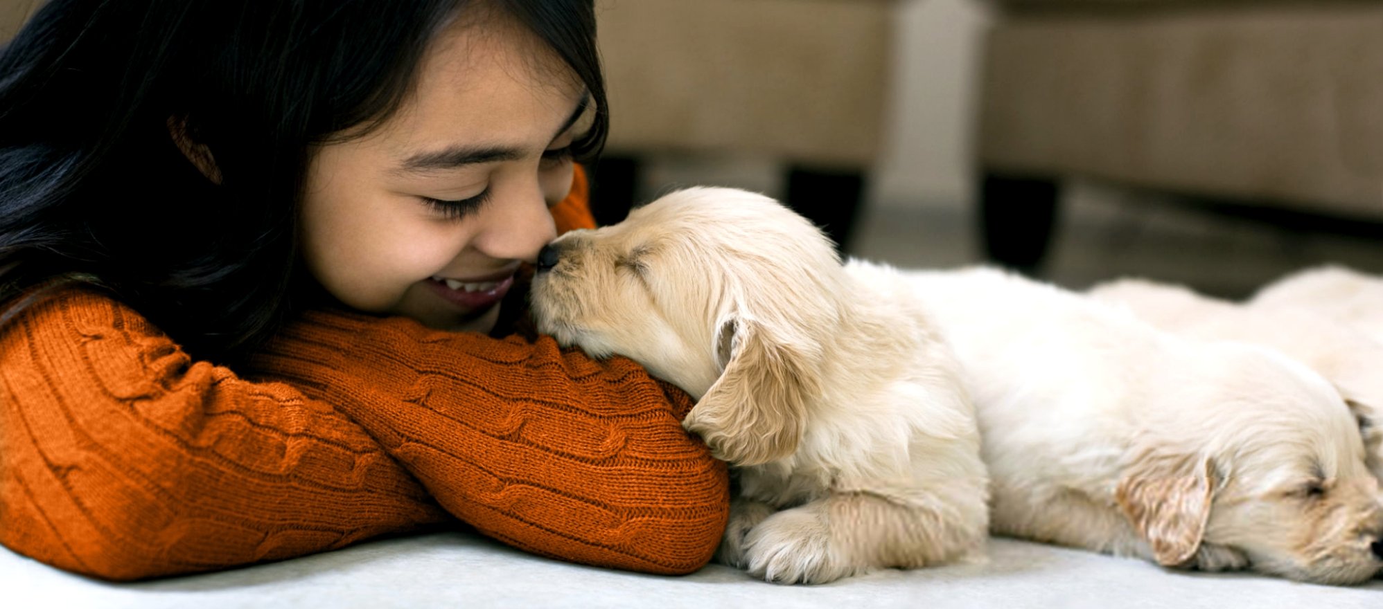 Young girl with puppy